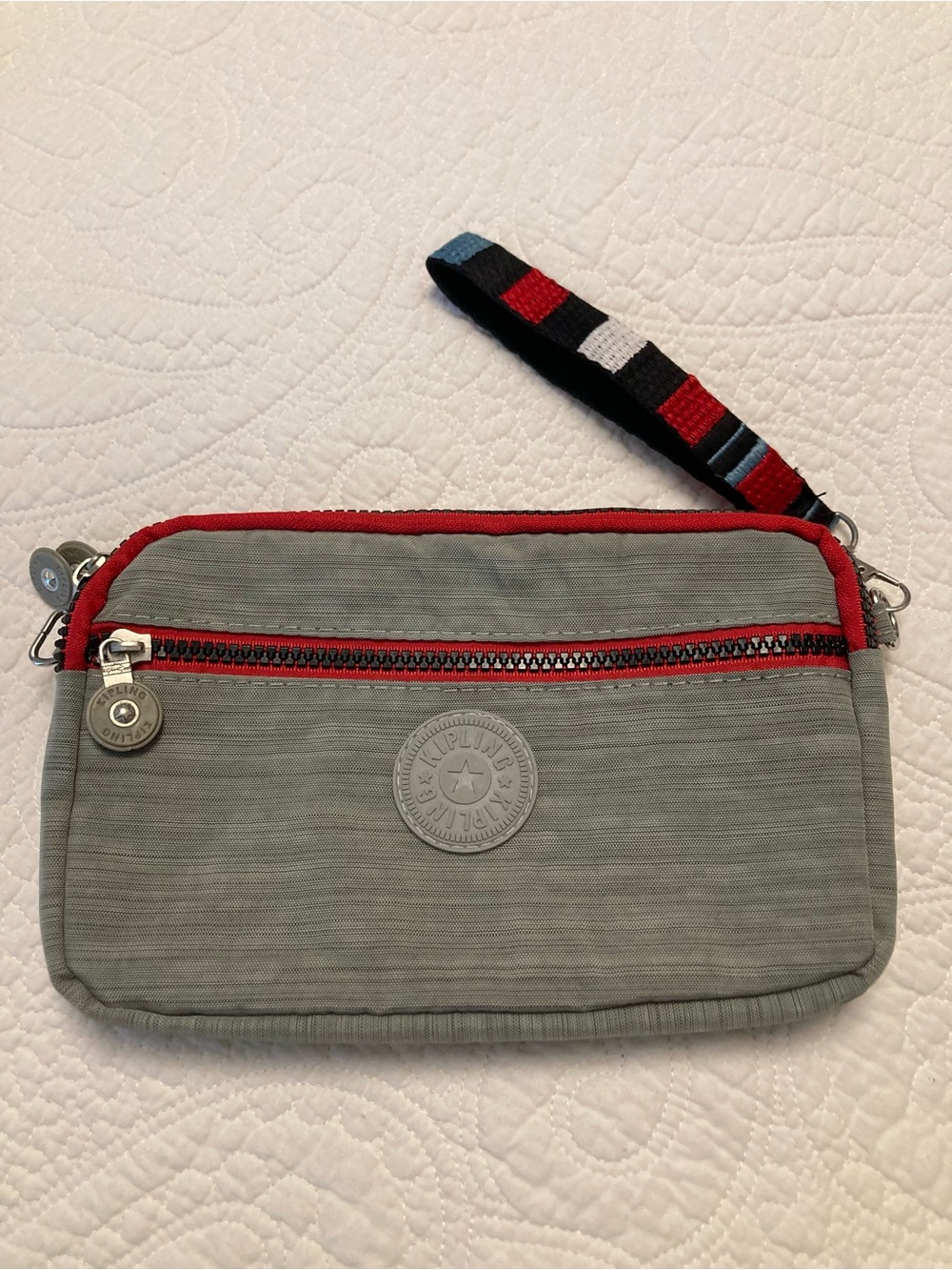 Kipling Gray and Red Triple-Zip Wristlet Pouch